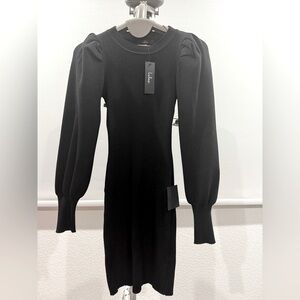 Black tight fit dress. Perfect for cold weather with your favorite pair of boots